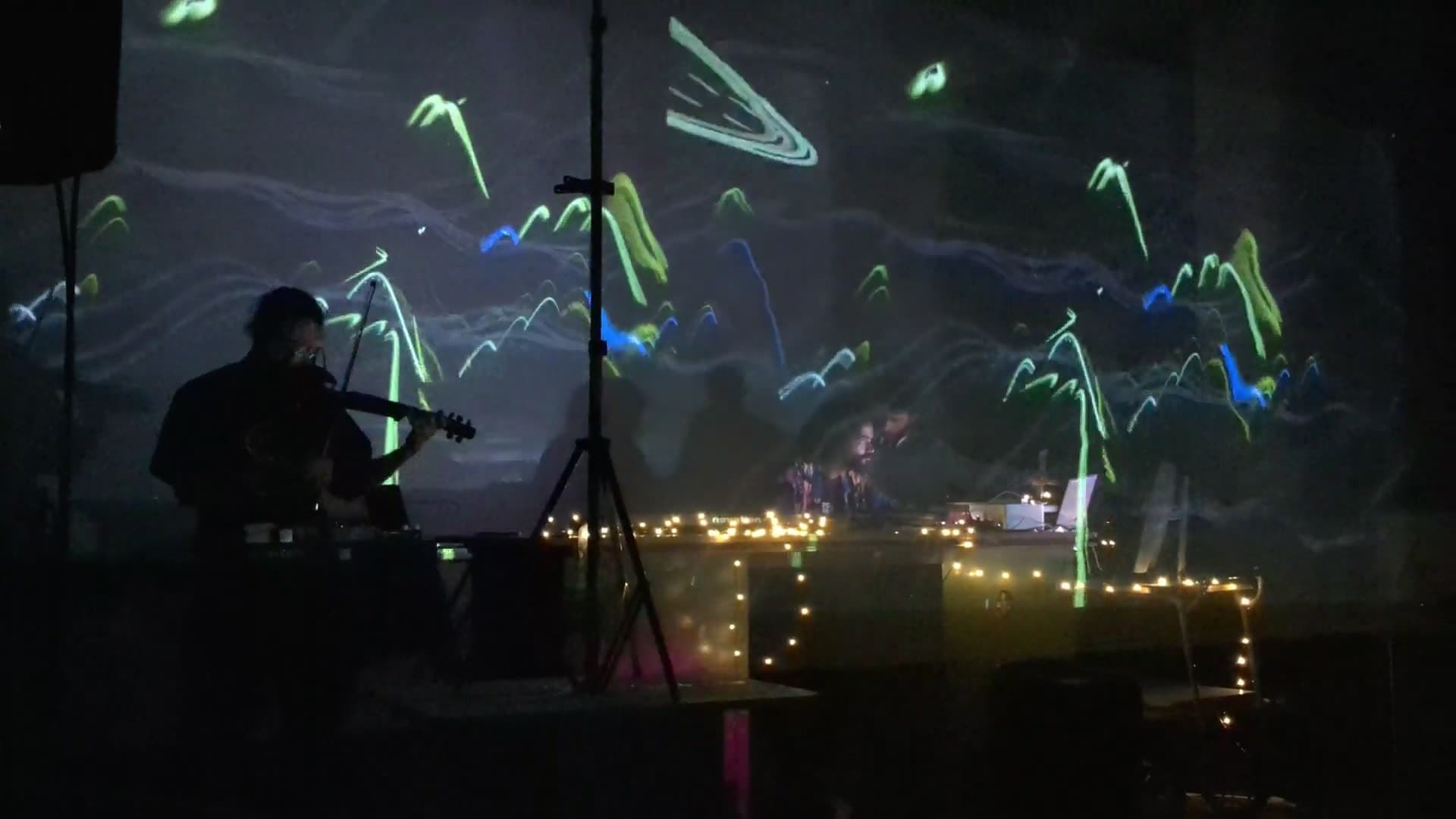 Live projection-mapped performance at Flutgraben, Berlin, July 2023